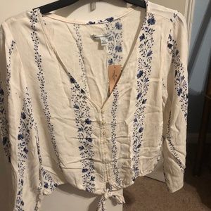 White and blue top. Size medium.